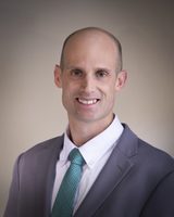 Matthew J Button